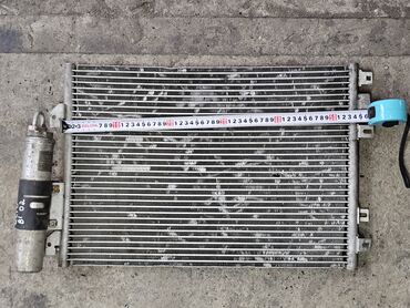 Радиаторы: Радиатор кондиционера Renault Clio 2, 2002г.в. Оригинал б/у, из — 2