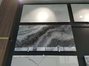 Kafel və metlax: Mərmər naxışlı bu keramik plitə müxtəlif interyer dizaynları üçün