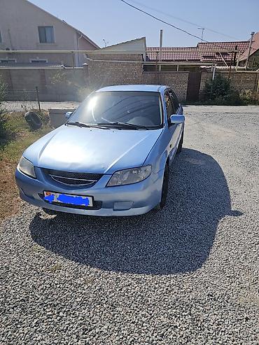 Mazda Familia: 2003 г., 1.6 л, Механика, Бензин, Хэтчбэк