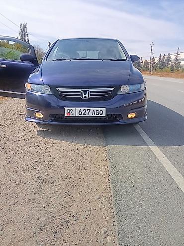 honda logo: Honda Odyssey: 2006 г., 2.4 л, Бензин, Минивэн — 1