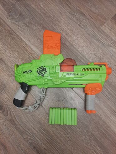 нерф бластер: Игрушечный бластер Nerf RevReaper в ярко-зеленом цвете, разработанный