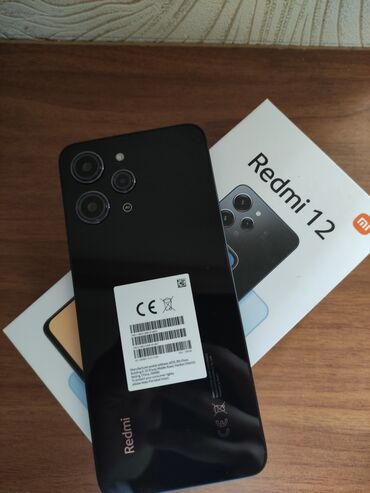 Xiaomi: Xiaomi Redmi 12, 256 ГБ, цвет - Черный, 
 Сенсорный, Отпечаток пальца, Две SIM карты