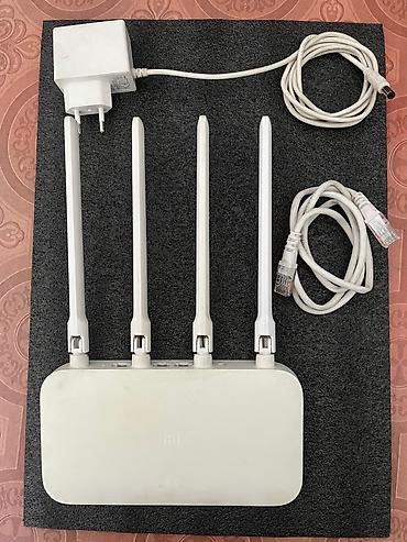 Wi‑Fi роутер Xiaomi Mi Router 4C (модель R4CM) Комплектация: - роутер