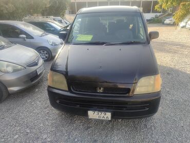 грузовой автомобиль: Honda Stepwgn (Stepwagon) — компактвэн/микроавтобус черного цвета
