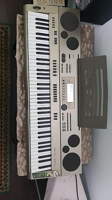 cd disk: Синтезатор Casio AT-5 Oriental Keyboard - Клавиатура: 61 — 1