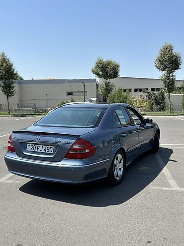 cls 63 amg: Mercedes-Benz E 200: 2 l | 2004 il Sedan — 4