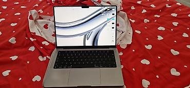 lg 4k: Ноутбук Apple MacBook Pro 14" (поколение с вырезом в экране) - Экран — 1
