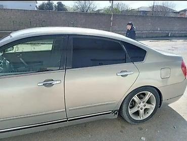 granta disk: Nissan Teana: 2.3 л | 2003 г. Седан — 5