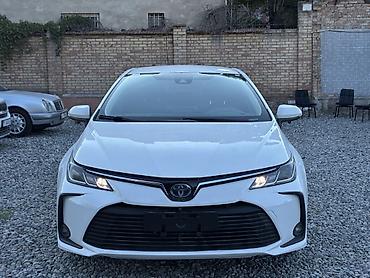 byd e1: Toyota Corolla: 2021 г., 1.8 л, Вариатор, Гибрид, Седан — 3