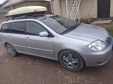 на corolla: Toyota Corolla: 2004 г., Механика, Универсал — 6