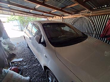 Toyota: Toyota Corolla sedan - Korpus: 4 qapılı sedan, ağ rəng - Nəsil — 6