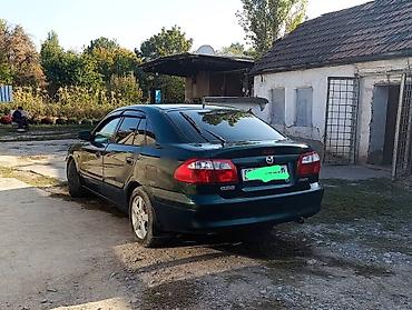 производитель ключей: Mazda 626: 2000 г., 2 л, Автомат, Бензин, Седан — 7