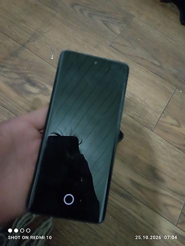 tecno spark: Смартфон POCO (серия M, 5G). Корпус чёрный, в комплекте виден защитный — 7