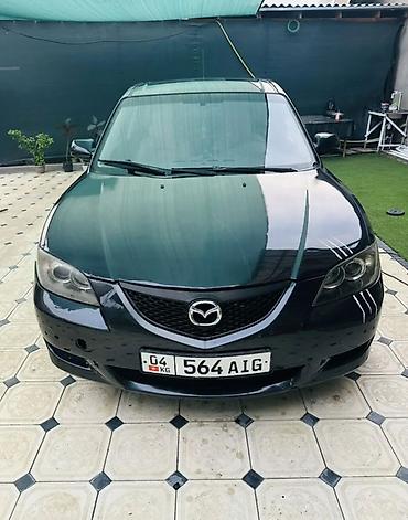 Mazda 3: 2009 г., Механика, Бензин, Седан