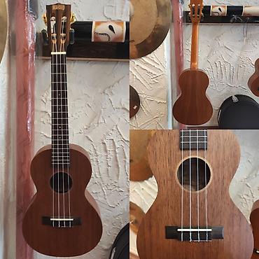 gitara tuner: Ukulele Mahalo MJ3TBRK Simlərin sayı: 4 Üst:Nato wood Qol: Mahogany — 1