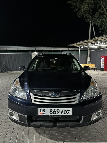 купить субару аутбек в бишкеке: Универсал Subaru Outback темно-синего цвета, оснащенный багажником на
