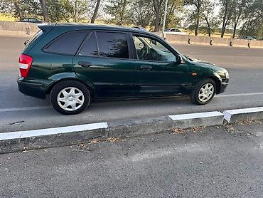 daf 95 480: Mazda 323: 2000 г., 1.6 л, Механика — 4