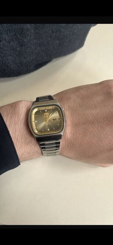 beş qaş üzüklər: Наручные часы, Orient, цвет - Золотой