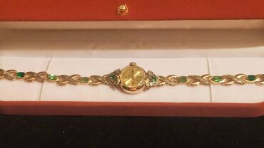 изумруд золото: Золотые часы "Чайка" с бриллиантами и изумрудами, 583 пробы