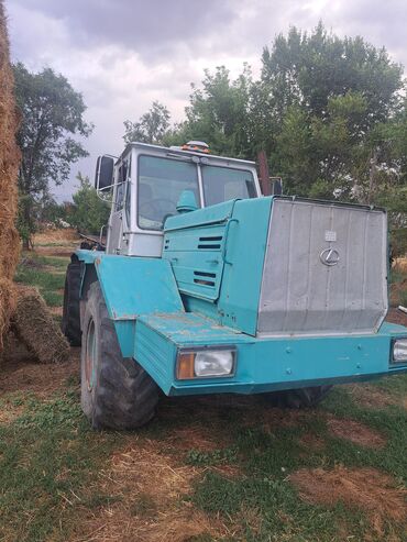 реставрация сидений авто: Мощный сельскохозяйственный трактор в бирюзово-серой окраске