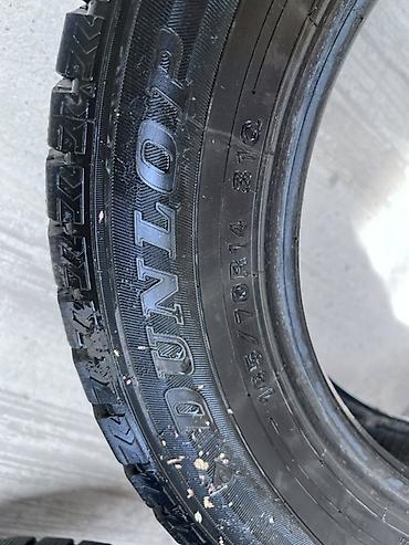 14 размер донголок: Комплект из 4 зимних шин Dunlop. Характеристики: - Размер: 185/70 R14 — 3