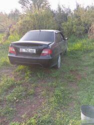 сатыла турган машина: Нехсия 2. 1.5 простой 2011 сом210мин сом