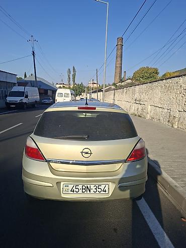 kia sorento 2015 on kapotu: Opel Astra: 1.4 l | 2004 il Hetçbek — 5