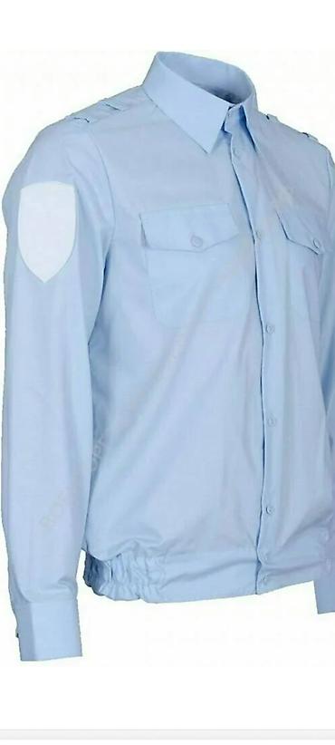 Рубашки: Мужская форменная рубашка белого цвета с длинным рукавом, производство — 15