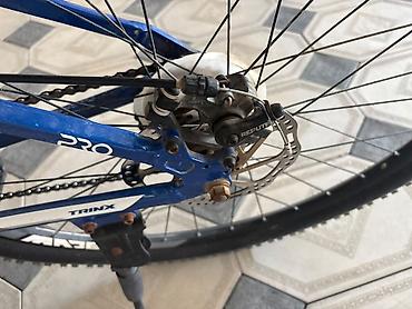 Velosipedlər: Trinx M720 dağ velosipedi - Çərçivə: yüngül ərintili alüminium, mavi — 7