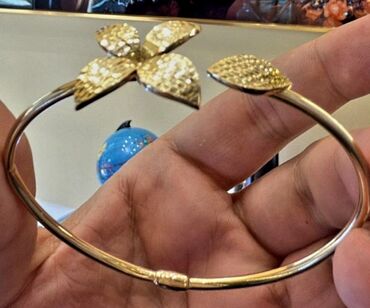 Zərgərlik dəstləri: Dəstə daxildir: Üzük, Sırğa, Sarı qızıl, 585 Əyar, 1112 g — 10