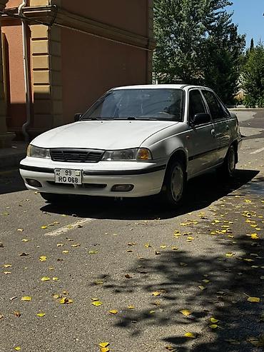 opel astra g opc: Ağ rəngli sedan, 4 qapılı, ön ötürücülü. Klassik, sadə dizaynlı kuzov — 5