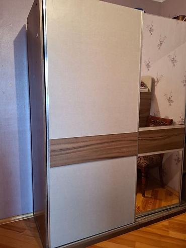 Sürgülü qapılı qarderob dolabı - Dizayn: İki qapılı sürgülü sistem;