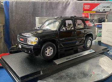 Avtomobil modelləri: Коллекционная модель GMC Yukon Denali black 2001 Welly Art  — 8