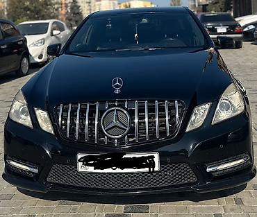 mercedes şəkilləri: Mercedes‑Benz E‑Class sedan (W212), qara rəng. Xarici: - AMG üslublu — 1