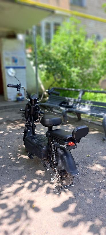 Скутеры: Электроскутер городского типа (черный) Комплектация: - Электроскутер — 2