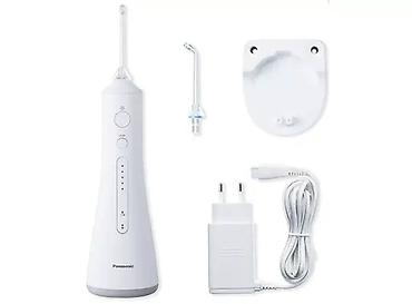 иригаторы: Ирригатор Panasonic, Портативный, Новый — 3