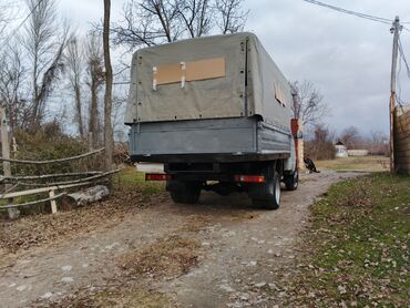 Yük maşınları: Salam 4 ton yükə yiğilmiş həm rama həm qurza 12 lik şiverlerle — 6