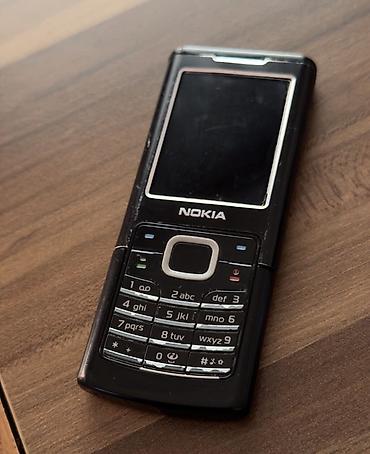 Nokia: Nokia 1, rəng - Qara, Düyməli — 1
