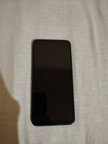telefon yaddaş kartı: Xiaomi Redmi 7, 32 GB, rəng - Mavi, 
 Düyməli, Barmaq izi, İki sim kartlı