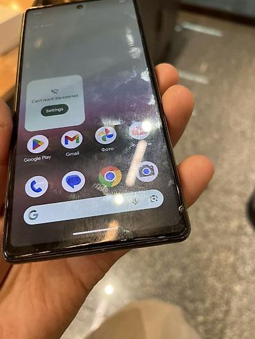 apple studio: Смартфон Google Pixel в белом цвете. Лаконичный фирменный дизайн с — 1