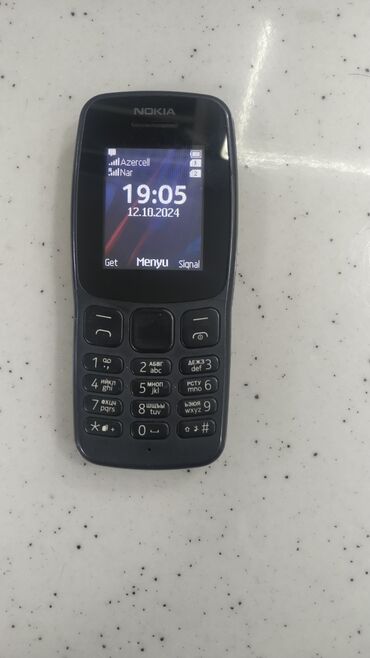 nokia 1100 qiymeti: Nokia 106, rəng - Qara, Zəmanət, Düyməli, İki sim kartlı