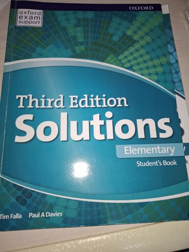 İdman və istirahət: Şəkildə "Third Edition Solutions Elementary Student's Book" və "Third
