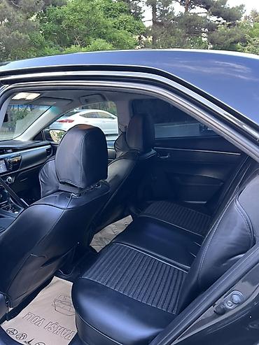 klas 6: Toyota Corolla: 1.6 l | 2014 il Sedan — 9
