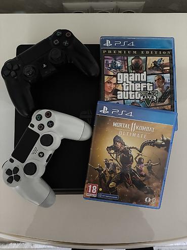 ревизия: PlayStation 4 Slim - 1 TB В комплекте: • Приставка • 2 геймпада — 1