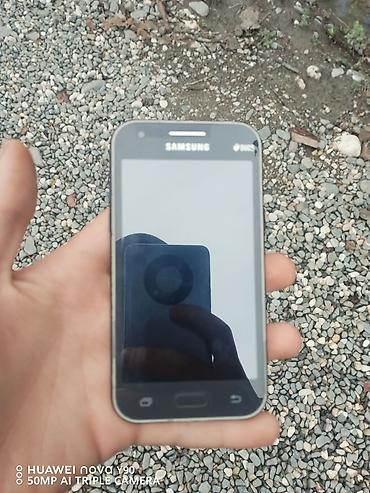 007 first light: Samsung Galaxy J1 Duos, rəng - Qara, İki sim kartlı — 3