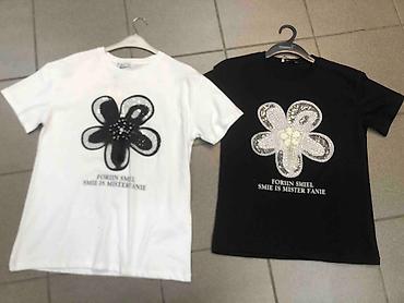 Majice kratkih rukava: Majice 
S M L 
Cena 2000 din — 1