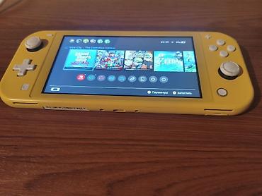 switch 2: Nintendo Switch Lite Konsol mukemmel veziyyetdedir Seliqeli istifade — 2