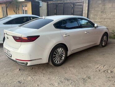 минивен руль слева: Белый седан Kia K7 (Cadenza) такси чолпон ата Бишкек