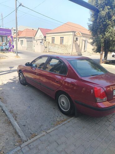 Hyundai: Hyundai Elantra: 1.6 l | 2005 il Sedan — 10