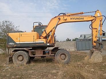 suzuki 125: Экскаватор, Hyundai, 2011 г., Колесный — 7